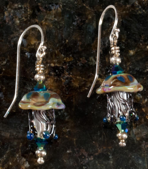 Ocean glass Jellyfish Earrings and starfish necklace captures the magic of the ocean.