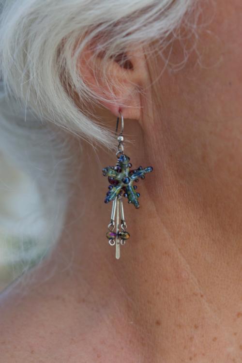 Blue Ocean Starfish Dangle Earrings on model